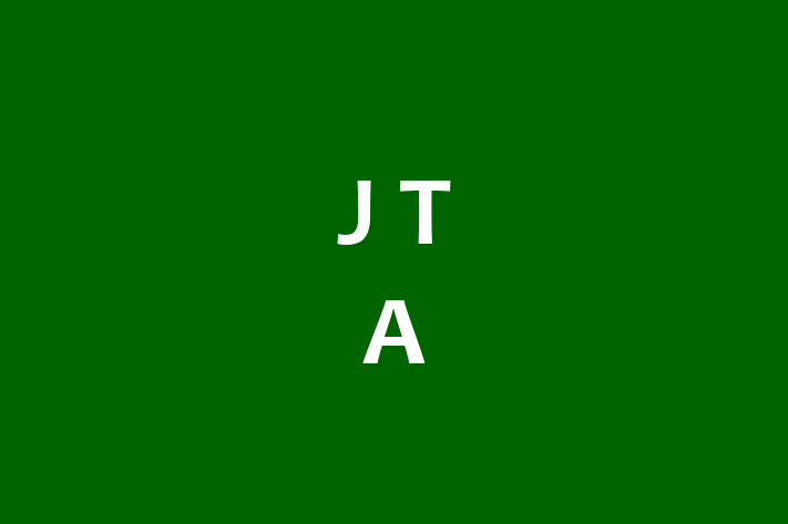 J T A